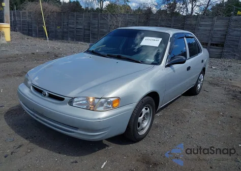 2000 Toyota Corolla Ve z USA, uszkodzony, nr VIN 2T1BR12E6YC309972